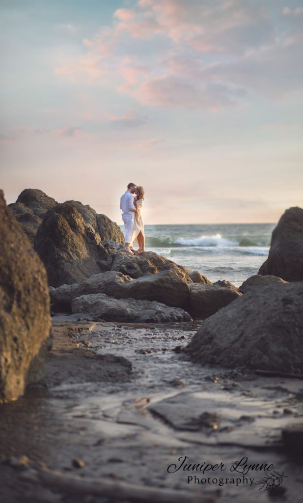 Romantic couple on beach at Ruby beach for destination photo session by Juniper Lynne Photography.
