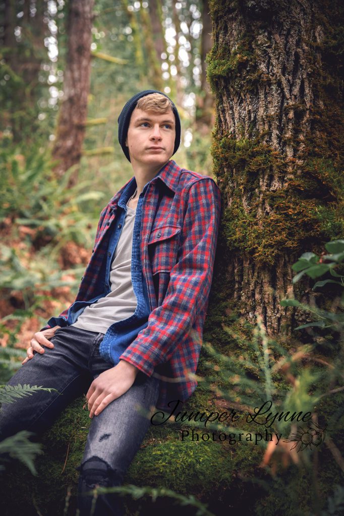 High School senior class of 2020 guy in pacific northwest forest with flannel at Manchester State Park in Port Orchard by Juniper Lynne Photography. 