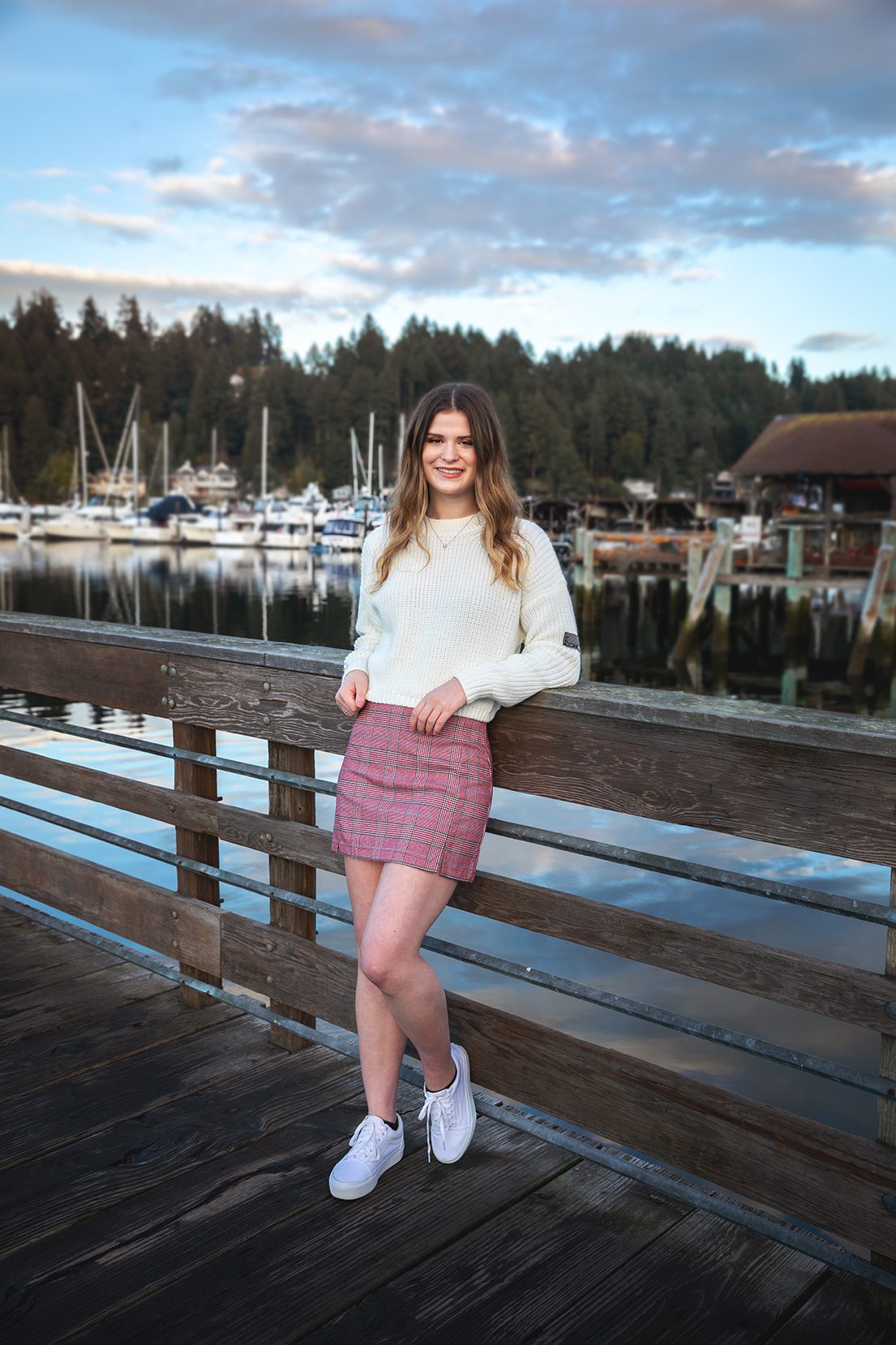 high school senior downtown gig harbor washington with boats in background